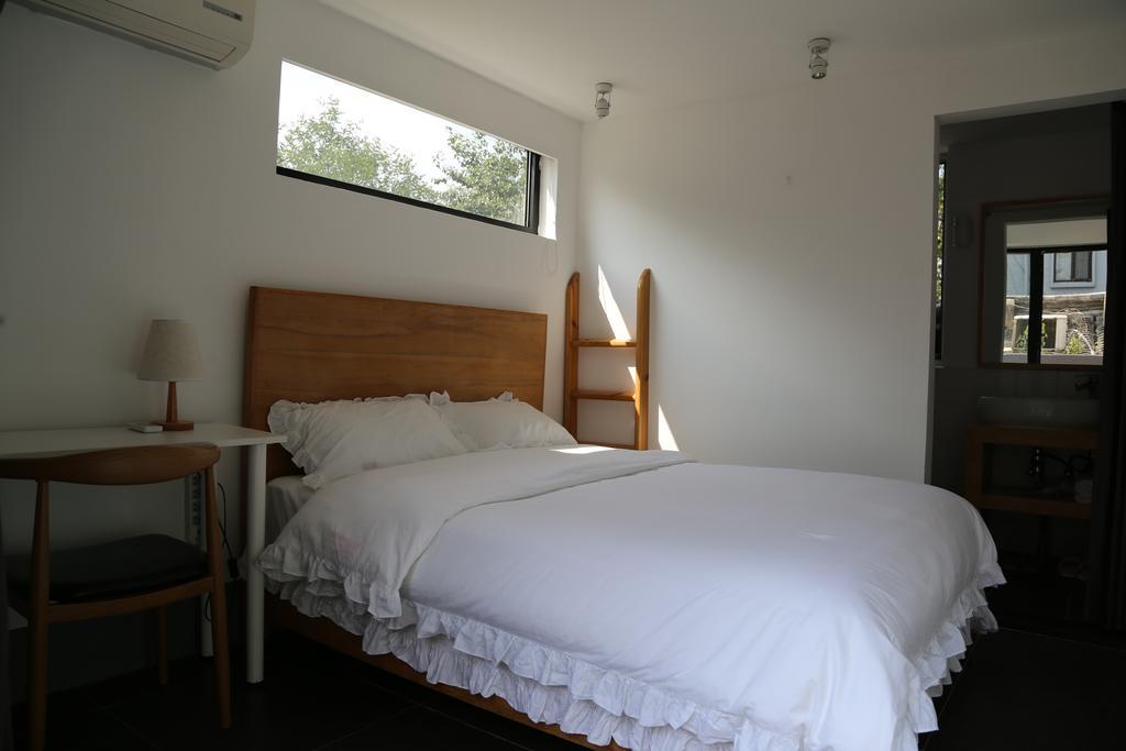 Beijing Wohkoon Hostel-Nan Luo Gu Xiang Branch Bagian luar foto